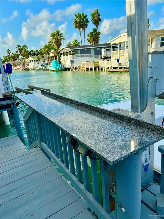 dock area featuring a water view