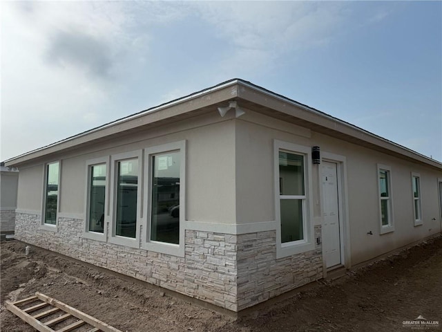 5322 Vision, Rio Grande City, TX 78582 - view of home's exterior featuring stone siding