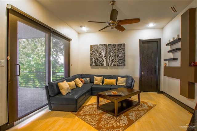 309 N Mockingbird Ave, Mission, TX 78572 - living room featuring light wood-style flooring and a ceiling fan