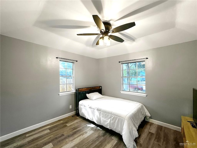 511 W Samano St, Edinburg, TX 78539 - bedroom featuring wood finished floors and ceiling fan