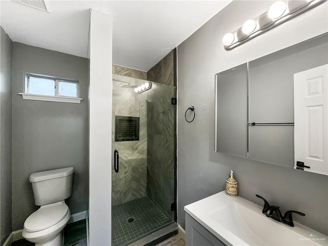 511 W Samano St, Edinburg, TX 78539 - bathroom featuring vanity and a shower stall