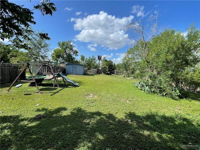1106 N N Ave N, Donna, TX 78537 - view of yard with a playground and a storage unit