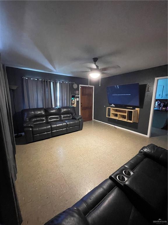1106 N N Ave N, Donna, TX 78537 - living area with a ceiling fan and tile patterned floors