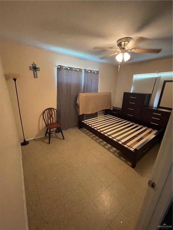 1106 N N Ave N, Donna, TX 78537 - bedroom with baseboards and a ceiling fan