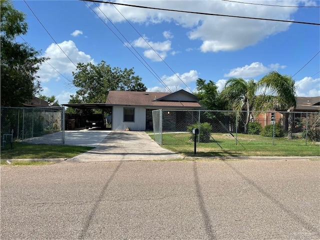 1106 N N Ave N, Donna, TX 78537 - view of front of house with driveway and a carport