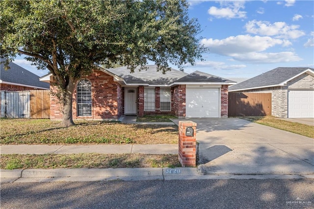 ranch-style house featuring a garage