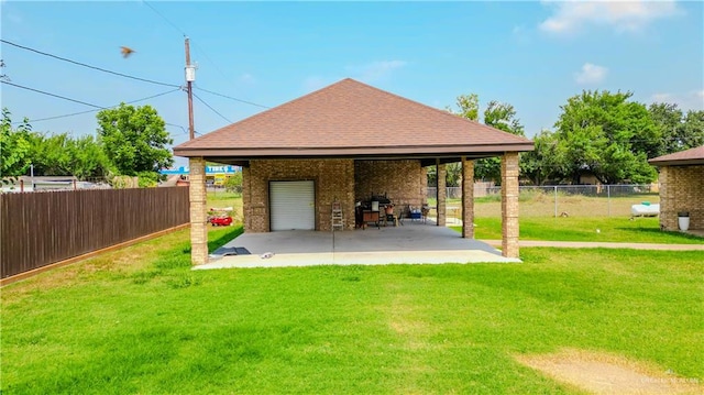 exterior space featuring a lawn and a patio