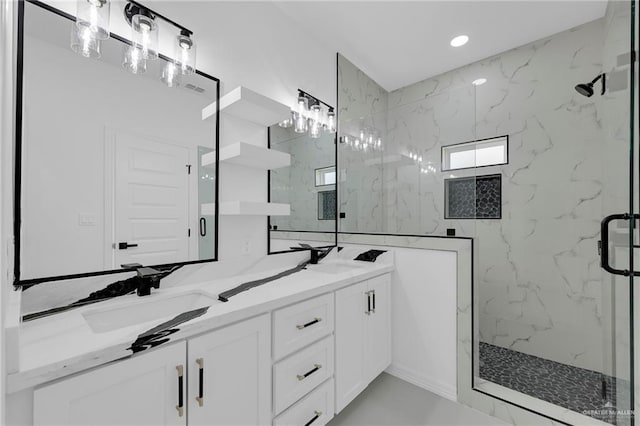 3433 E Kidd Ave, Edinburg, TX 78542 - bathroom featuring a marble finish shower, double vanity, and recessed lighting