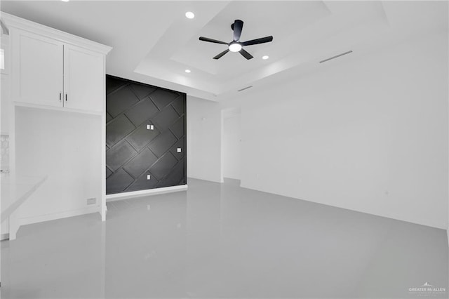 3433 E Kidd Ave, Edinburg, TX 78542 - spare room with a tray ceiling, a ceiling fan, and recessed lighting