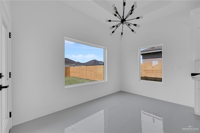 3433 E Kidd Ave, Edinburg, TX 78542 - empty room featuring a chandelier