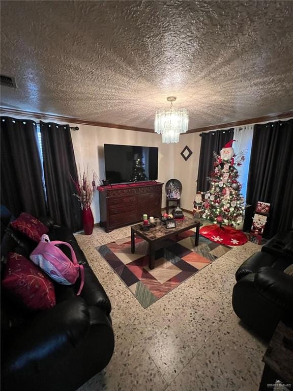 living room featuring a chandelier, visible vents, ornamental molding, and a textured ceiling