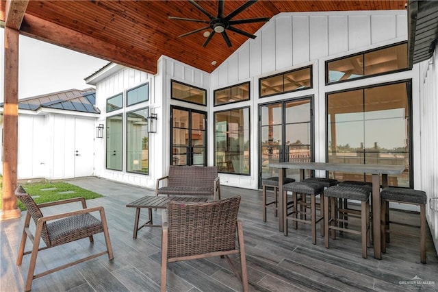 exterior space featuring ceiling fan