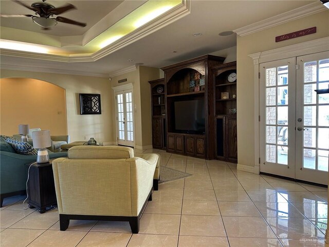 5845 Acacia St, Harlingen, TX 78552 - living area featuring crown molding, french doors, a ceiling fan, and light tile patterned floors