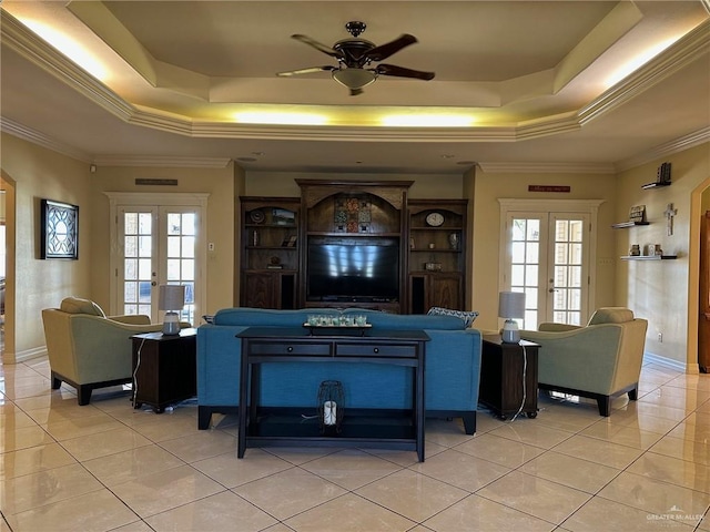 5845 Acacia St, Harlingen, TX 78552 - living room with french doors, a raised ceiling, light tile patterned floors, healthy amount of natural light, and ornamental molding