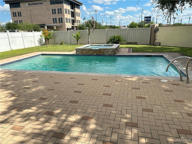 5845 Acacia St, Harlingen, TX 78552 - view of swimming pool featuring an in-ground hot tub, a fenced backyard, and a patio area