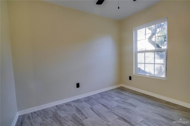 spare room featuring ceiling fan