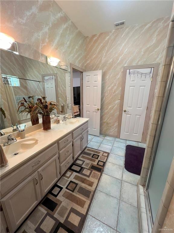 bathroom featuring vanity and walk in shower