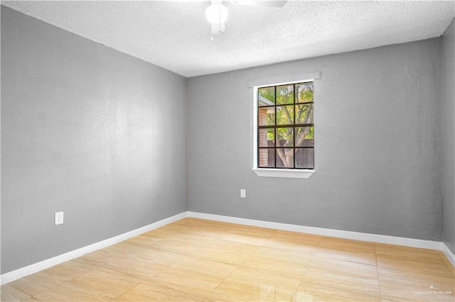 3109 Raul Gonzalez Dr, Mercedes, TX 78570 - empty room featuring a textured ceiling and a ceiling fan