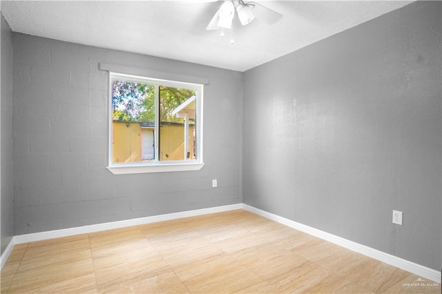 3109 Raul Gonzalez Dr, Mercedes, TX 78570 - empty room featuring baseboards and ceiling fan