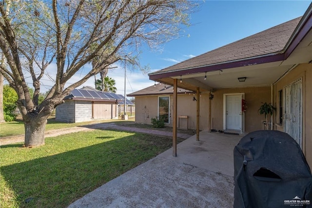 exterior space featuring an outbuilding and area for grilling