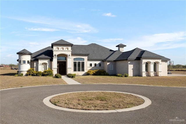 view of front of home with a front yard