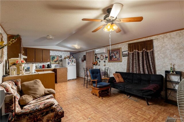 living room featuring a wall unit AC, ceiling fan, light parquet floors, and lofted ceiling