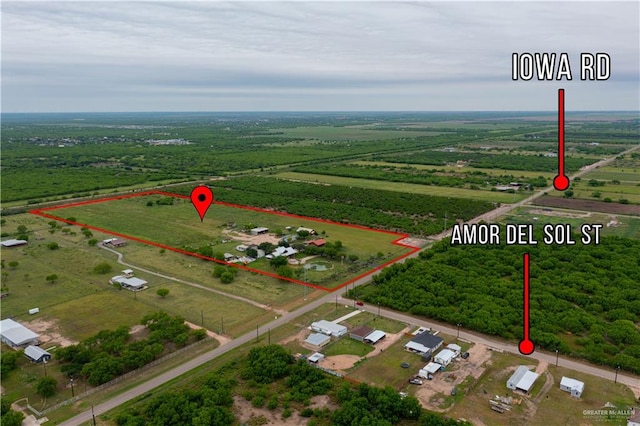 birds eye view of property featuring a rural view