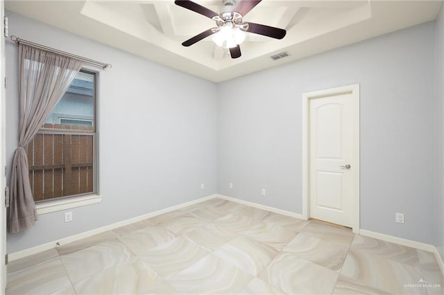 5105 August Ct, Edinburg, TX 78539 - spare room featuring a raised ceiling, visible vents, baseboards, and ceiling fan