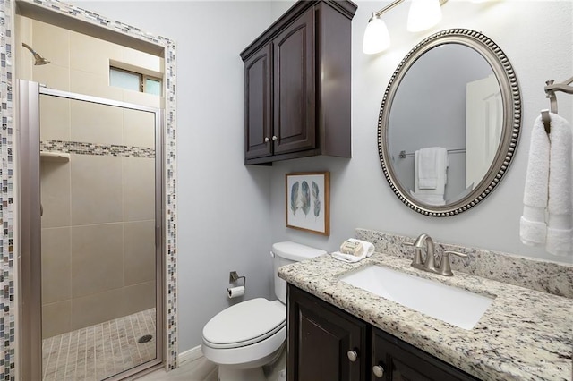 5105 August Ct, Edinburg, TX 78539 - bathroom featuring vanity, toilet, and a stall shower