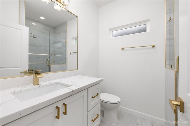 900 N Trinity St, Edinburg, TX 78541 - bathroom featuring vanity, marble look tile flooring, and a marble finish shower