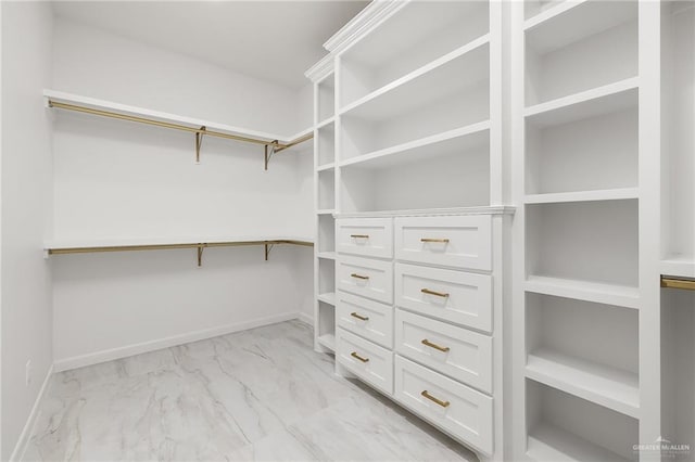 900 N Trinity St, Edinburg, TX 78541 - walk in closet with light marble finish floors