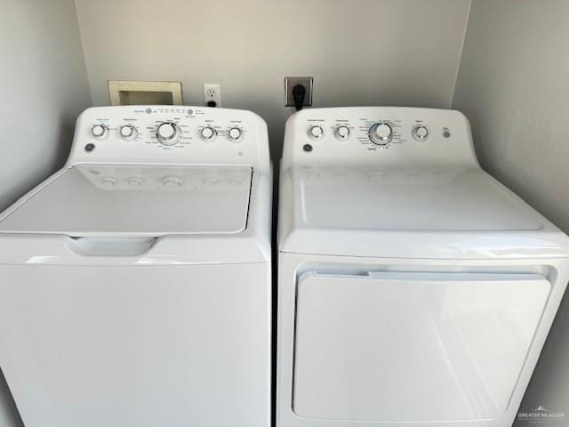 laundry area featuring separate washer and dryer