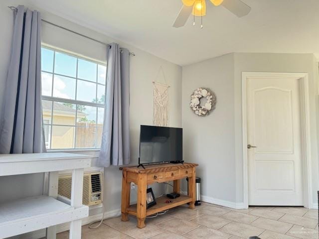 living room with light tile patterned flooring and ceiling fan