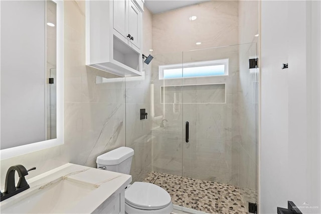 2229 N Ruby St, Edinburg, TX 78541 - full bath with toilet, a shower stall, and vanity