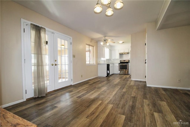 living area featuring carpet, ceiling fan, visible vents, and wood finished floors