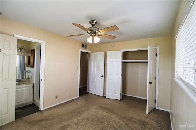 carpeted bedroom featuring ceiling fan and baseboards