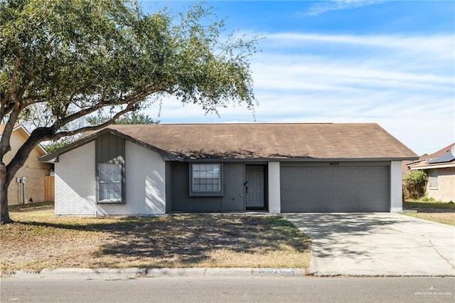 ranch-style home featuring a garage