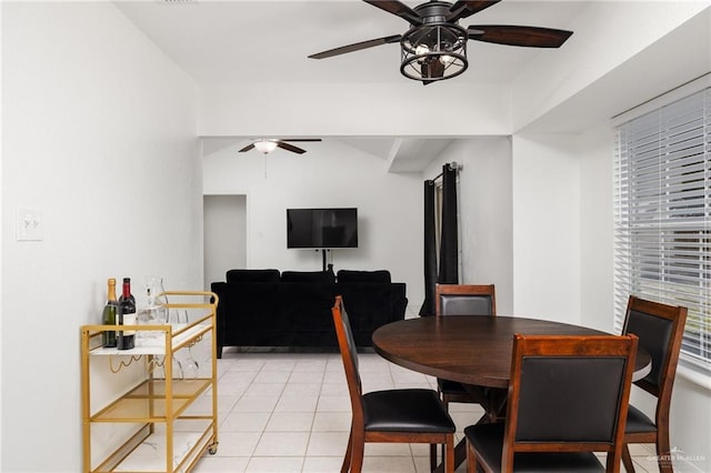 dining room with ceiling fan and light tile patterned flooring