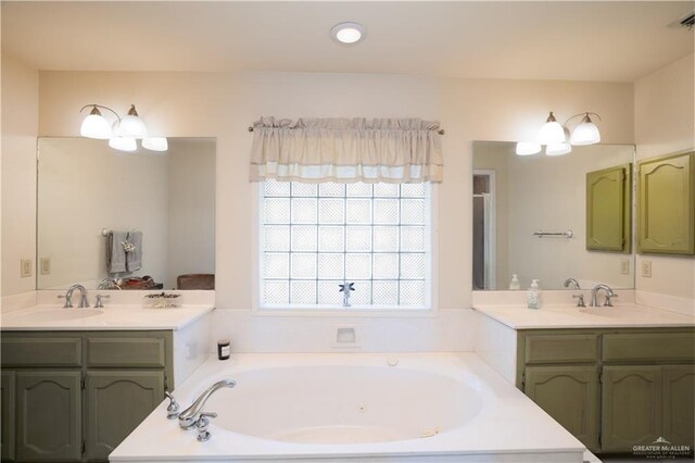 bathroom featuring a bathing tub and vanity