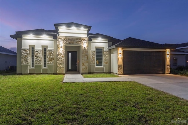 view of front facade with cooling unit, a lawn, and a garage