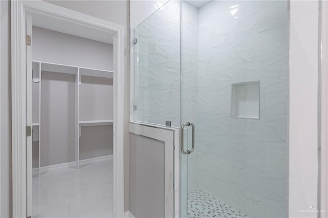 bathroom with an enclosed shower