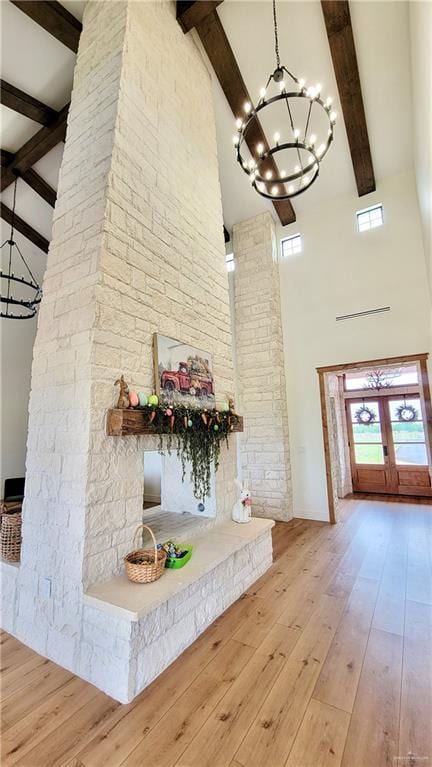 3417 Horizon Trl, Edinburg, TX 78541 - interior space with high vaulted ceiling, beamed ceiling, a chandelier, and hardwood / wood-style floors