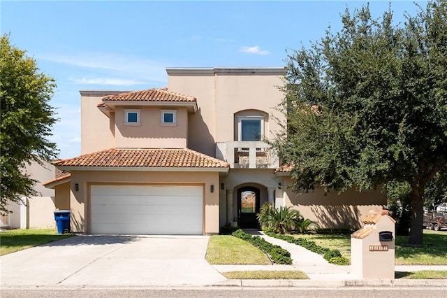 mediterranean / spanish-style home with a garage