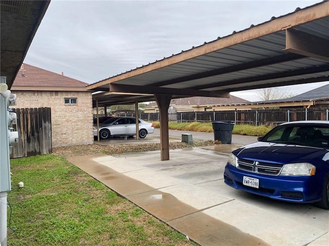 view of parking / parking lot with a carport