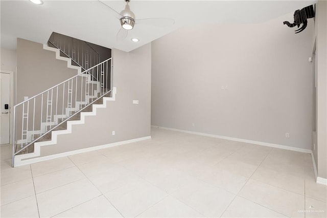 interior space featuring tile patterned floors, recessed lighting, and baseboards