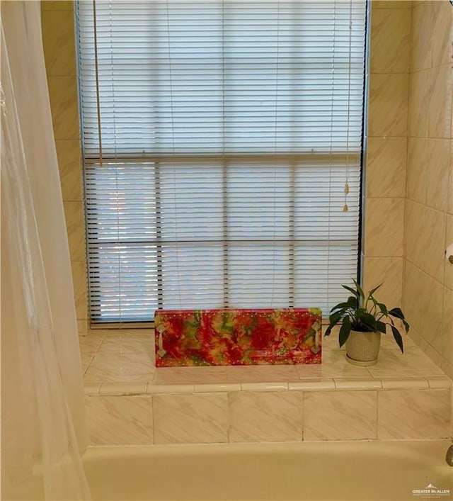 3713 Gonzalez Ln, Mcallen, TX 78504 - bathroom view of shower / tub combo with curtain