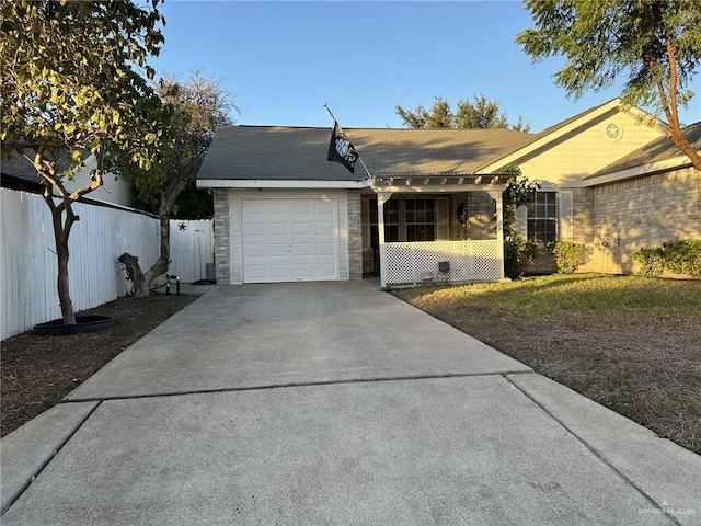 2104 Fairmont Ave, Mcallen, TX 78504 - ranch-style house featuring a garage and driveway