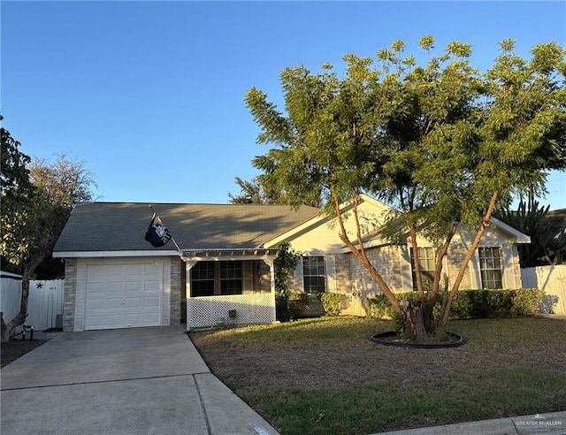 2104 Fairmont Ave, Mcallen, TX 78504 - ranch-style house featuring a garage and driveway