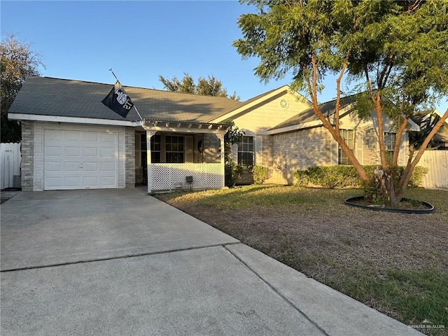 single story home featuring a garage