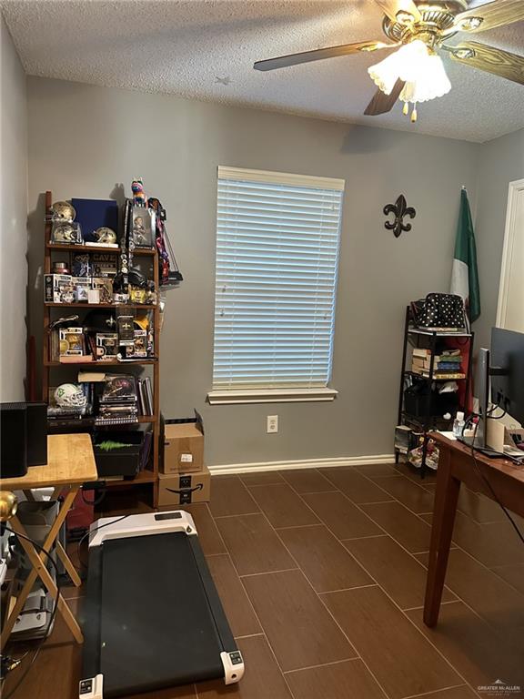 2104 Fairmont Ave, Mcallen, TX 78504 - office area featuring ceiling fan and a textured ceiling